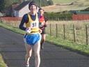 Robin and Nick finish leg 1 for Over 50s team