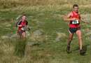 Adam and James arrive at Kirkstone Pass at end of leg 1 to hand over to Andy and Steven