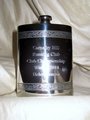 Helen gets an engraved pewter hip flask and a £50 voucher from Run & Become