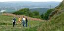 Adam approaches the wood with Wallace Monument in background