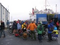 On the way to Jura, cyclists wait for the ferry at Port Askaig , Islay