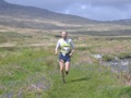 Showing the strain, Gordon Pryde of Lomond approaches 3 Arch Bridge