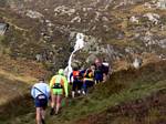 Joanne Anderson (Carnethy) in a group. Leaders visible ahead.