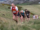 The wednesday night handicap winner, Mike Lynch, tries his hand at the Bog Trot