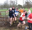 Jamie Hardie leading Ronnie through the muddy gate