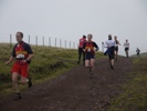 Jason Hubert leads Andrew Shepherd down to Castlelaw Farm